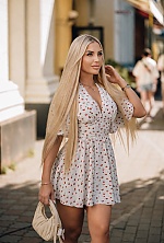 Ukrainian mail order bride Olga from Kyiv with blonde hair and blue eye color - image 4