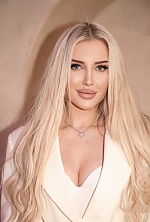 Ukrainian mail order bride Olga from Kyiv with blonde hair and blue eye color - image 9