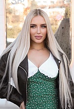 Ukrainian mail order bride Olga from Kyiv with blonde hair and blue eye color - image 14