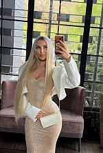 Ukrainian mail order bride Olga from Kyiv with blonde hair and blue eye color - image 5