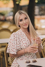Ukrainian mail order bride Olga from Kyiv with blonde hair and blue eye color - image 3