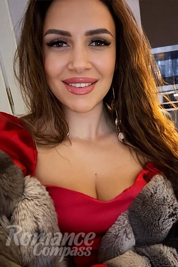 Ukrainian mail order bride Olha from Lviv with light brown hair and green eye color - image 1