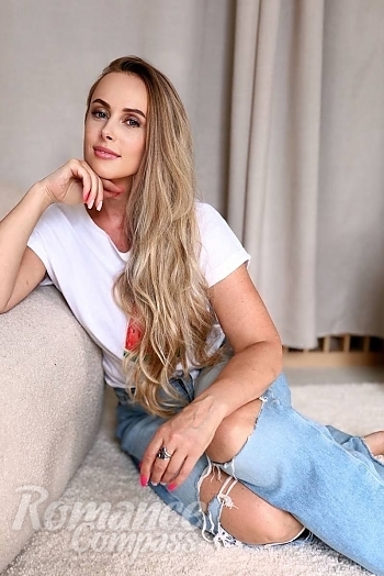Ukrainian mail order bride Olena from Kyiv with blonde hair and blue eye color - image 1
