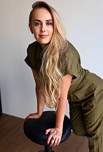 Ukrainian mail order bride Olena from Kyiv with blonde hair and blue eye color - image 8