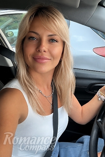 Ukrainian mail order bride Margarita from Oslo with blonde hair and blue eye color - image 1