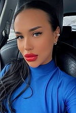 Ukrainian mail order bride Karyna from Kyiv with black hair and green eye color - image 5