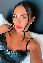 Ukrainian mail order bride Karyna from Kyiv with black hair and green eye color - image 4