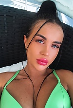 Ukrainian mail order bride Karyna from Kyiv with black hair and green eye color - image 11
