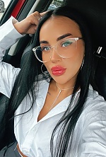 Ukrainian mail order bride Karyna from Kyiv with black hair and green eye color - image 9