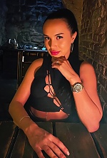 Ukrainian mail order bride Karyna from Kyiv with black hair and green eye color - image 10