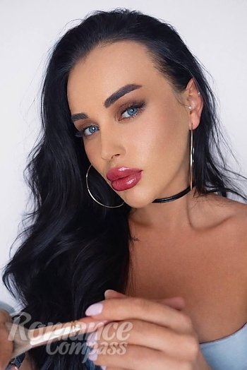 Ukrainian mail order bride Karyna from Kyiv with black hair and green eye color - image 1