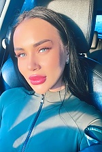 Ukrainian mail order bride Karyna from Kyiv with black hair and green eye color - image 8