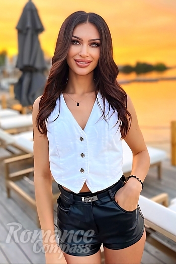 Ukrainian mail order bride Angela from Serres with black hair and grey eye color - image 1
