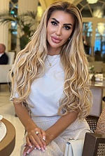 Ukrainian mail order bride Olga from Cannes with blonde hair and brown eye color - image 3