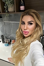 Ukrainian mail order bride Olga from Cannes with blonde hair and brown eye color - image 9