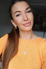 Ukrainian mail order bride Natalia from Bern with brunette hair and green eye color - image 4
