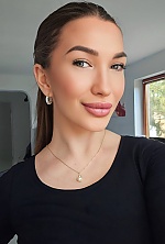 Ukrainian mail order bride Natalia from Bern with brunette hair and green eye color - image 5