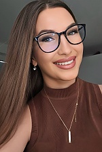 Ukrainian mail order bride Natalia from Bern with brunette hair and green eye color - image 6