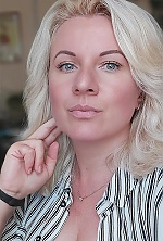 Ukrainian mail order bride Nataliia from Chernivtsi with blonde hair and blue eye color - image 4