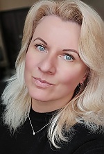 Ukrainian mail order bride Nataliia from Chernivtsi with blonde hair and blue eye color - image 7