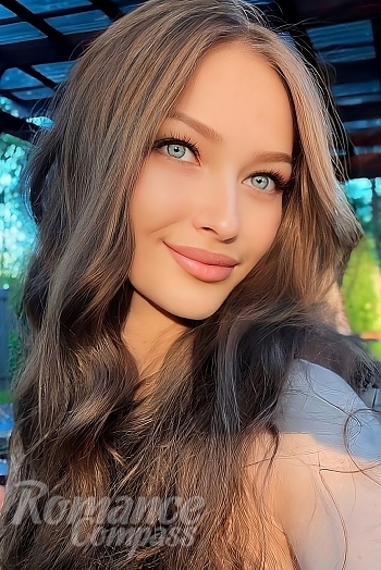 Ukrainian mail order bride Veronika from Kyiv with brunette hair and blue eye color - image 1