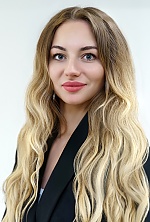 Ukrainian mail order bride Anastasia from Kyiv with blonde hair and green eye color - image 3