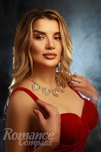 Ukrainian mail order bride Olha from Lviv with light brown hair and brown eye color - image 1