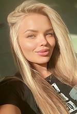 Ukrainian mail order bride Svitlana from Bucharest with blonde hair and blue eye color - image 5