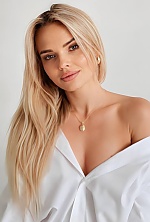 Ukrainian mail order bride Svitlana from Bucharest with blonde hair and blue eye color - image 3