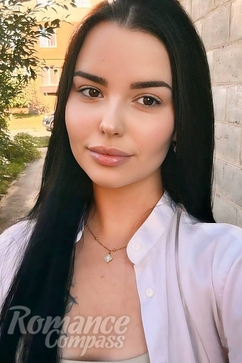 Ukrainian mail order bride Eleonora from Kharkiv with black hair and brown eye color - image 1