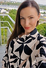 Ukrainian mail order bride Oksana from Brussels with brunette hair and green eye color - image 8
