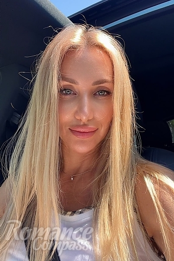 Ukrainian mail order bride Natalia from Valencia with blonde hair and blue eye color - image 1