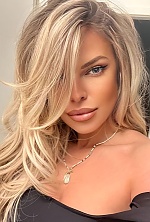 Ukrainian mail order bride Ada from Bucharest with blonde hair and blue eye color - image 6