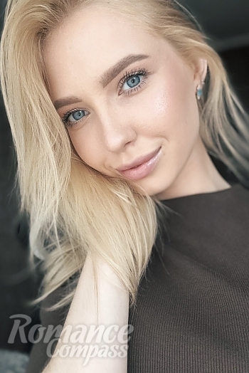 Ukrainian mail order bride Nelli from Odesa with blonde hair and blue eye color - image 1
