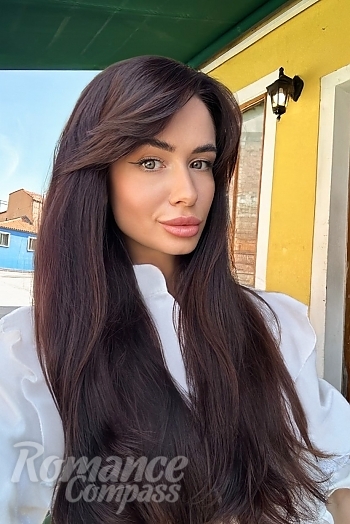 Ukrainian mail order bride Anastasia from Kyiv with black hair and brown eye color - image 1