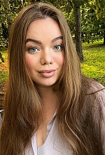 Ukrainian mail order bride Arina from Kyiv with light brown hair and blue eye color - image 4