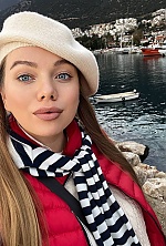 Ukrainian mail order bride Arina from Kyiv with light brown hair and blue eye color - image 21