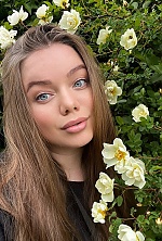 Ukrainian mail order bride Arina from Kyiv with light brown hair and blue eye color - image 8