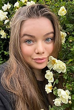 Ukrainian mail order bride Arina from Kyiv with light brown hair and blue eye color - image 9