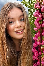 Ukrainian mail order bride Arina from Kyiv with light brown hair and blue eye color - image 10