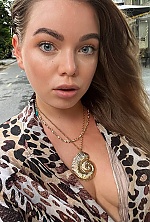 Ukrainian mail order bride Arina from Kyiv with light brown hair and blue eye color - image 14