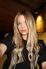 Ukrainian mail order bride Viktoriia from Ivano-Frankivsk with blonde hair and blue eye color - image 4