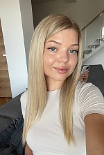 Ukrainian mail order bride Viktoriia from Ivano-Frankivsk with blonde hair and blue eye color - image 10