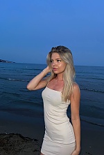 Ukrainian mail order bride Viktoriia from Ivano-Frankivsk with blonde hair and blue eye color - image 11