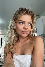 Ukrainian mail order bride Viktoriia from Ivano-Frankivsk with blonde hair and blue eye color - image 9