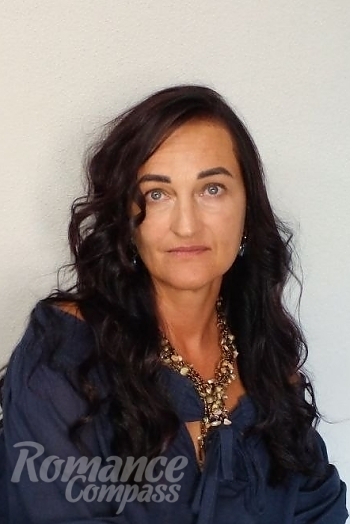 Ukrainian mail order bride Nataliia from Rivne with black hair and blue eye color - image 1