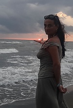Ukrainian mail order bride Nataliia from Rivne with black hair and blue eye color - image 12