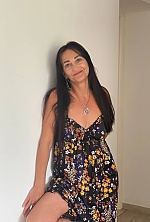 Ukrainian mail order bride Nataliia from Rivne with black hair and blue eye color - image 2