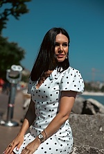 Ukrainian mail order bride Irina from Desenzano del Garda with black hair and green eye color - image 17