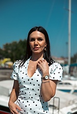 Ukrainian mail order bride Irina from Desenzano del Garda with black hair and green eye color - image 4